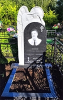 резной памятник скорбящая